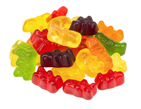 Eye-level view of a pile of colorful gummy candies in various shapes and colors, featuring a sweet assortment of fruit flavors, perfect for candy and dessert themes.