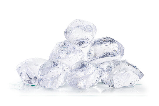 Pile of transparent ice cubes covered in fresh water drops.  for refreshing drink and summer cooling concepts on white background.