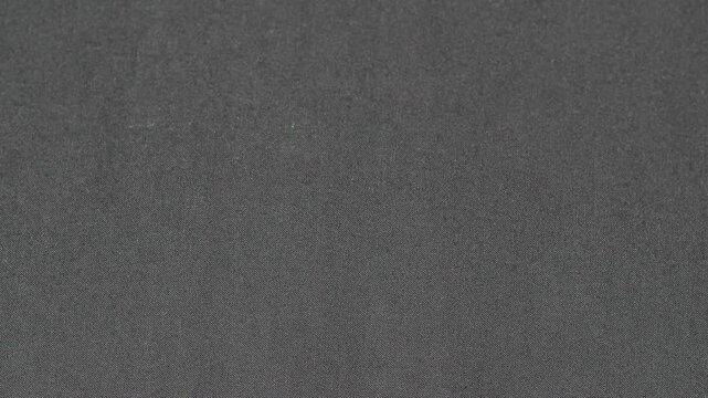 Stop Motion Animation of Dark Fabric Texture Background