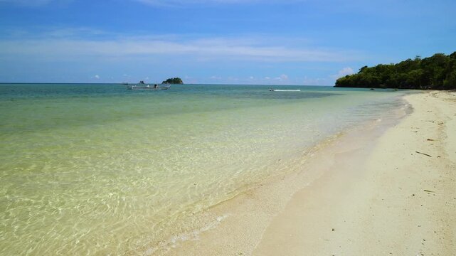 White Sandy Beach with Calm Tropical Sea