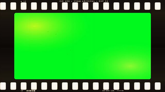 Archival 35mm photographic film negative frame with green screen chroma key