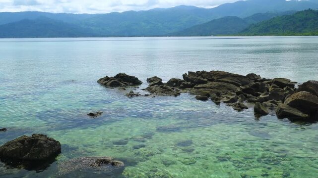 Rocky Reef in Crystal Clear Tropical Sea