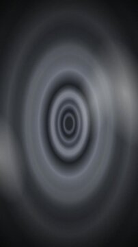Monochrome concentric ripples radiating seamless loop background