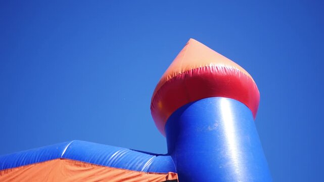  An Inflatable Bounce House over Clear Blue Sky
