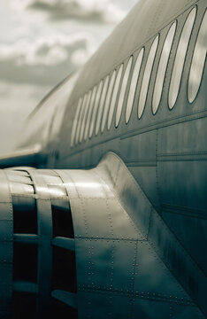 Vintage Aircraft Fuselage Detail with Riveted Metal Panels