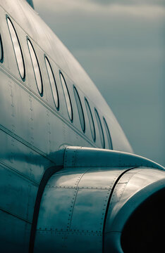 Close-Up of Aircraft Fuselage Showing Rivets and Windows