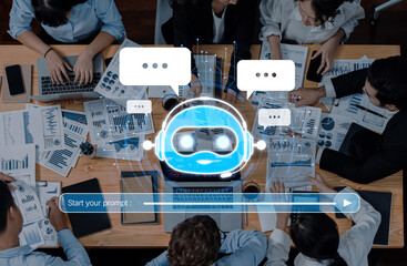 Naklejka na ściany i meble A diverse team working in a modern office setting utilizes AI technology for data analysis, enhancing collaboration and productivity during strategic meetings. Trope