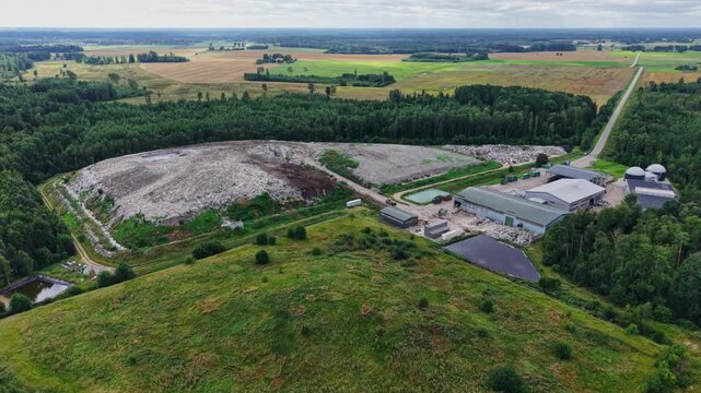 Landfill mound and recycling plant reveal modern waste management across Latvia