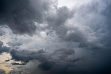 Obraz premium Dark sky with stormy clouds. Dramatic sky rain,Dark clouds before a thunder-storm,clouds before rain