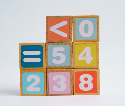 Number wood block cubes for learning Mathematic, education math concept.