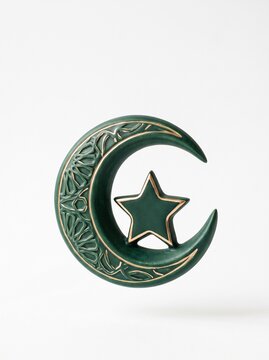 Crescent moon and star Islamic symbol emblem on a clean white background