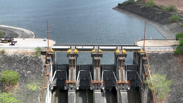 Betania Dam Spillway and Hydroelectric Infrastructure in Huila, Colombia. Establishing Shot. Aerial View.