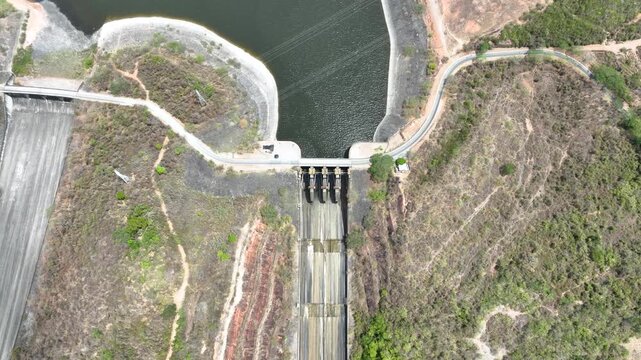 Betania Dam and Hydroelectric Reservoir in Huila, Colombia. Establishing Shot. Aerial View.