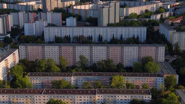 Berlin cityscape with residential apartment blocks and green spaces, reflecting German urban architecture and housing. Wonderful aerial view drone flyover panorama