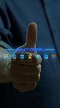 Businessman showing thumbs up vertical shot above glowing quality control text hub with approval icons. Corporate process evaluation, customer satisfaction results, and standard system concept.