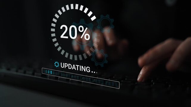 Hands Typing on Keyboard with Digital Interface Displaying Update Progress and Download Percentage Indicator on Dark Background. Entropy.