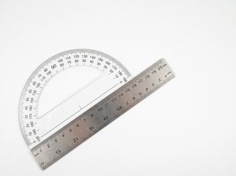 Protractor and steel ruler on white background