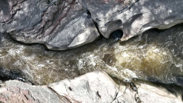 Estrecho del Magdalena River Rapids Surrounded by Rock Formations and Tropical Forest in Colombia. Slow Motion. Establishing Shot. Aerial View.