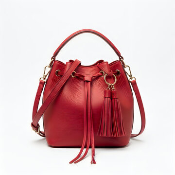 Brown leather drawstring bucket bag with tassel