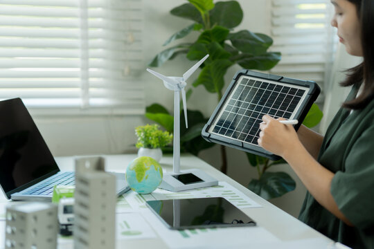 Businesswoman Presents Innovative Solar Panel Solutions and Renewable Energy Strategies to Lead Green Business Growth and Environmental Responsibility Sustainability Through Clean Energy