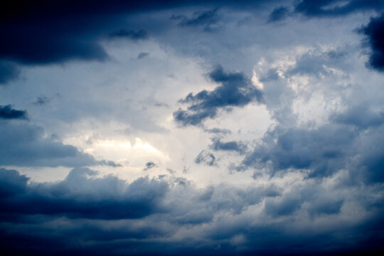 Dark dramatic clouds in an unsaturated sky