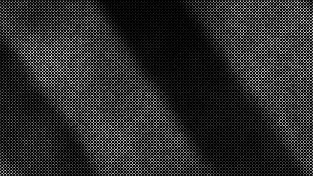 Grunge halftone dots with soft diagonal shadows moving across, dark monochrome dotted texture background for retro designs