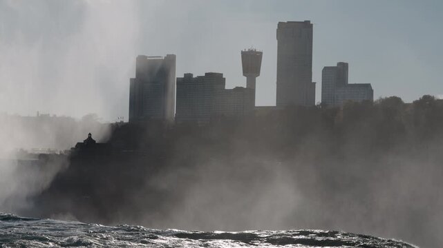 Misty View of Niagara Falls Canada and Skylon Tower from American side of Niagara Falls