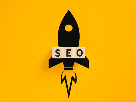 Black rocket silhouette with SEO text launching, symbolizing search engine optimization, digital marketing, website traffic and growth launch concept.