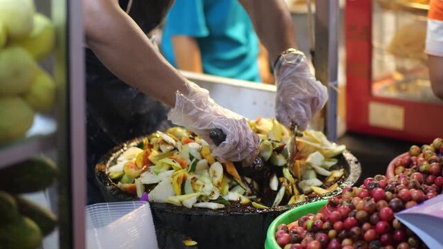 Making rujak petis. Rujak is a Indonesian traditional salad. Rujak is one of popular traditional food from Indonesia. This one is simple and delicious, also contains many useful fiber and vitamin.