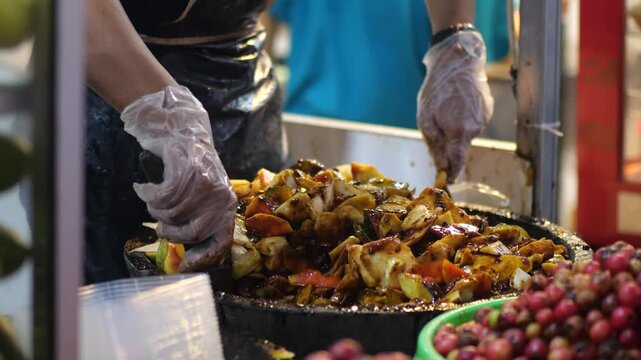 Making rujak petis. Rujak is a Indonesian traditional salad. Rujak is one of popular traditional food from Indonesia. This one is simple and delicious, also contains many useful fiber and vitamin.