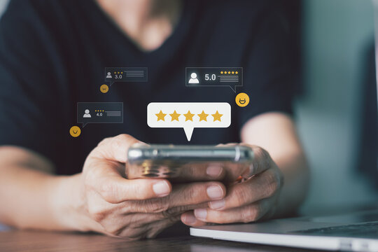 Customer using smartphone with 5-star rating hologram. Client feedback, online review, user experience, service satisfaction, digital survey and evaluation concept for top business quality.