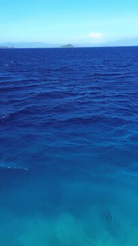 Aerial View of Clear Turquoise Tropical Ocean Waters