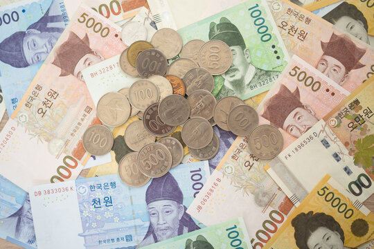 The currency of Korea which is used to represent value in exchange and the won is the main currency of Korean people. Korean won notes for money concept background.