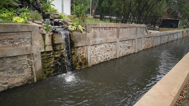 Taman Bendera Pusaka is a green open space used for recreational activities such as play for both children and adults, as well as jogging and features a wastewater management system for the river.