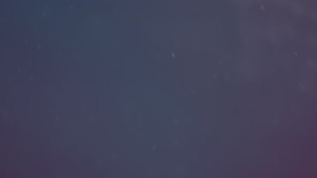 Abstract dark blue gradient background with soft floating particles and subtle violet glow, slow motion, copy space