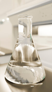 Erlenmeyer flask with clear liquid in laboratory research setting