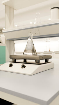 Laboratory hot plate with erlenmeyer flask filled with clear liquid