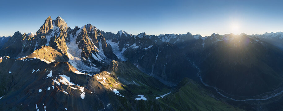Panorama of sunrise in Caucaia mountain with peak Ushba, Beautiful landscape nature world scenery. Georgia