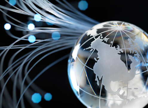Globe and fibre optics, black background