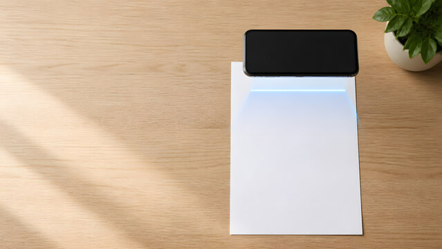 Phone scanning a paper document on a wooden desk
