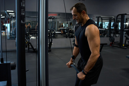 Man doing triceps pushdown