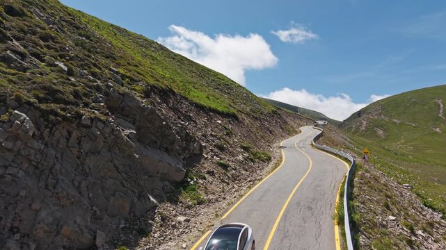 Transalpina Road Through Narrow Rocky Cut