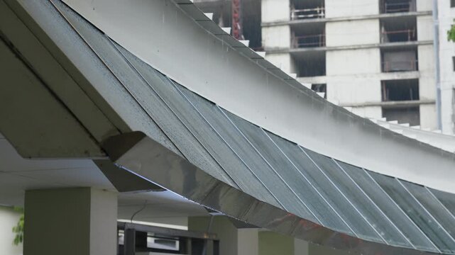 Rain falling on a glass roof canopy