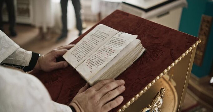 Priest Reading an Open Liturgical Book During an Orthodox Church Service