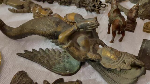 Antique Handcrafted Copper Winged Figure and Vintage Brass Figurines Display