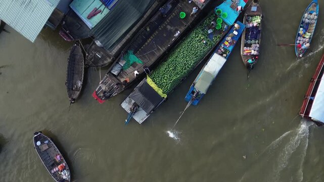 Aerial shot of traditional fruit trading on the river, Cai Rang floating market, Mekong Delta, Can Tho, Vietnam