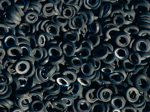 Aerial view of a massive pile of discarded rubber tires at an automobile recycling facility in Dacono, Colorado, United States.
