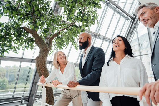 Colleagues attend a sustainable green business trade fair