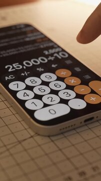 Using Calculator app on the phone for calculation.