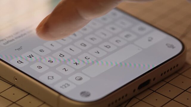 Man hands chatting and typing on smartphone macro closeup. Unrecognizable human typing text message tapping touchscreen keyboard using whatsapp application a social media